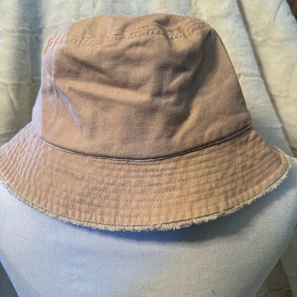 David and Young Khaki colored Bucket Hat. Has a Butterfly on the front New